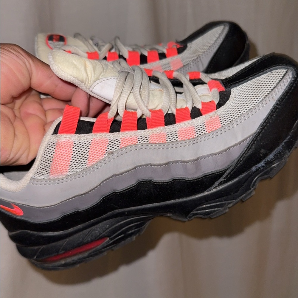 Nike Black and Gray Sneakers with Red Highlights